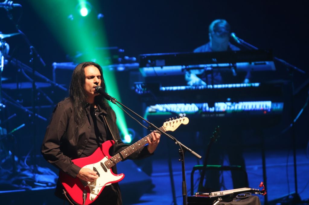 Azim Keshavjee, Comfortably Numb's lead singer and guitarist, plays every riff with passion. This is now their fourth straight sold-out show at the ACT.