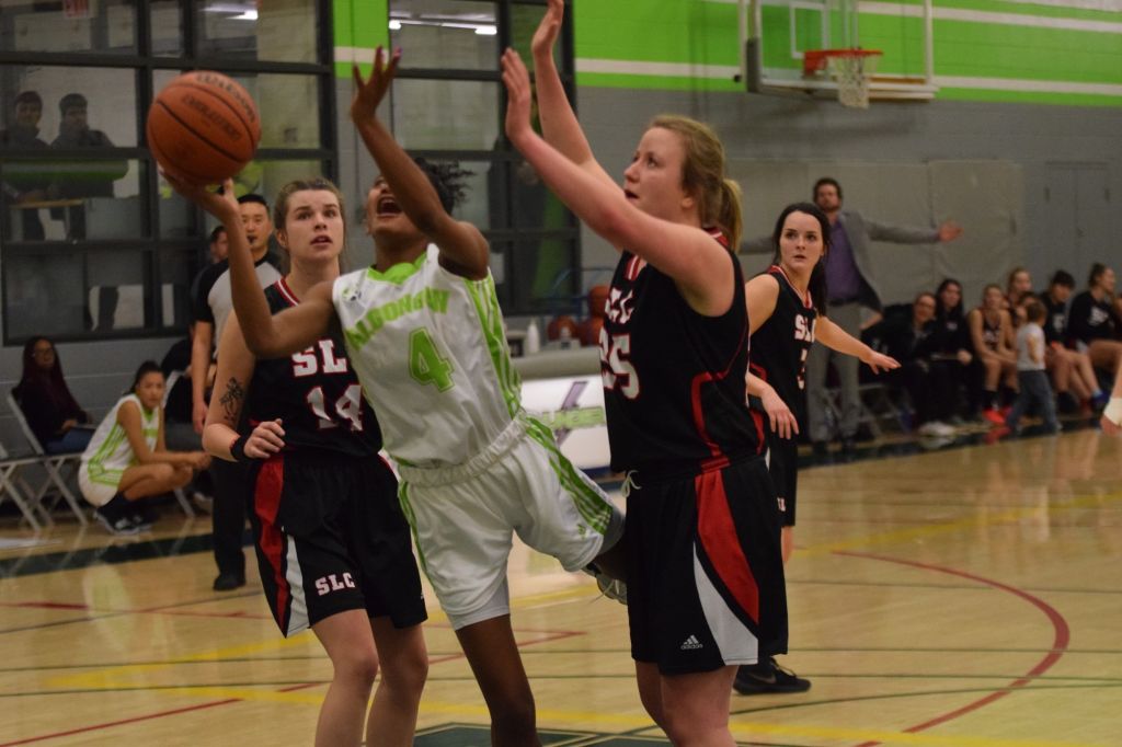 Hadeza Ismaila puts up a shot after being contested by Vikings player Mikaela Appleby on the way to the basket.