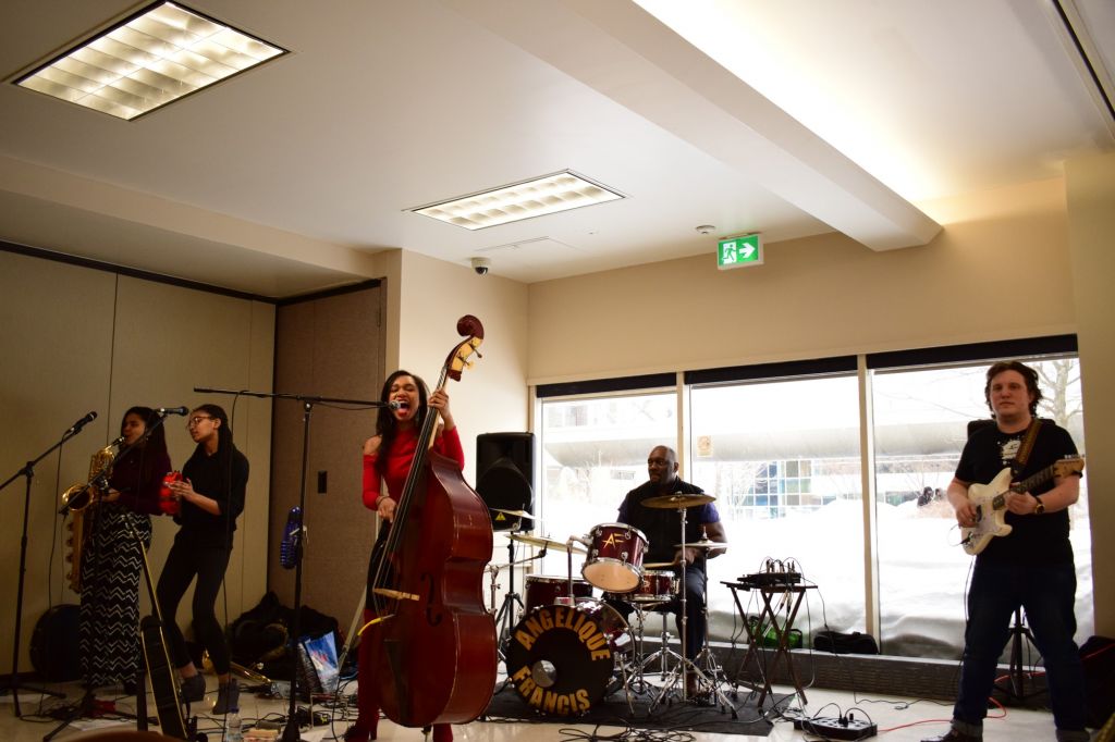 Angelique Francis and her band performing on Feb. 7 in the cafeteria of D-building.