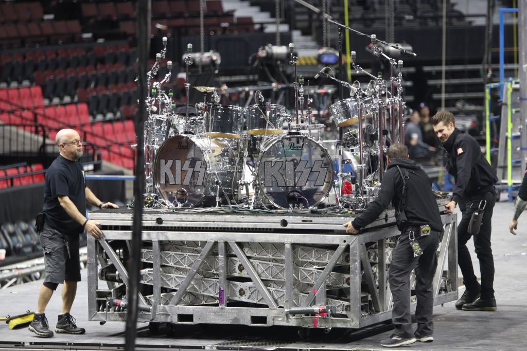 Crew assemble the set and stage for the rock band KISS on April 3. Music industry arts students were invited in the morning to witness the set-up.