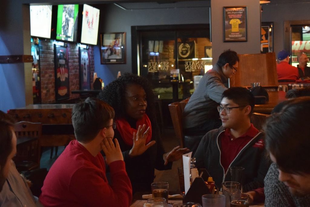 Mitzie Hunter speaking to students at The Senate Tavern on her policies.