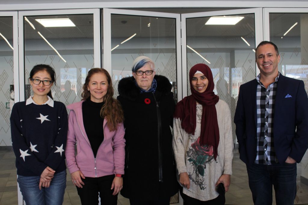 Digital health students and professor at the digital health week workshop. Left to right