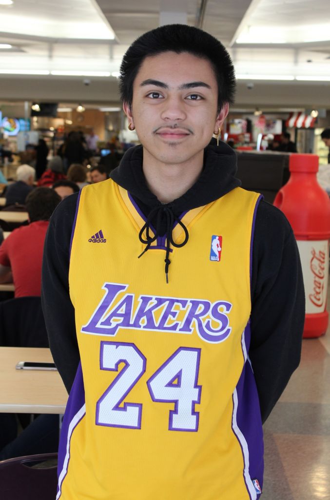 Brad Saberon, 20, a pre-health sciences student at Algonquin College, proudly wearing a Kobe Bryant Lakers jersey.