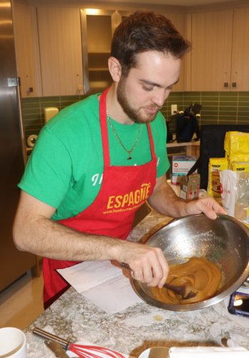 Hunter mixes the batter for his chocolate chip cookie recipe.