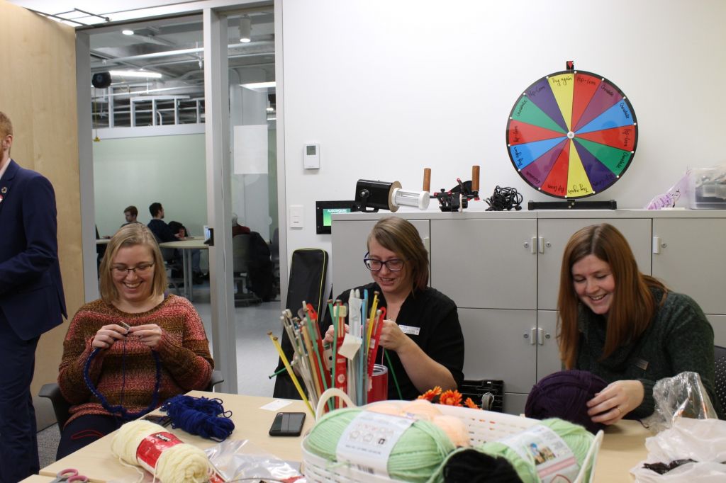 Knitting newbies and pros unwind with employee craft event Algonquin