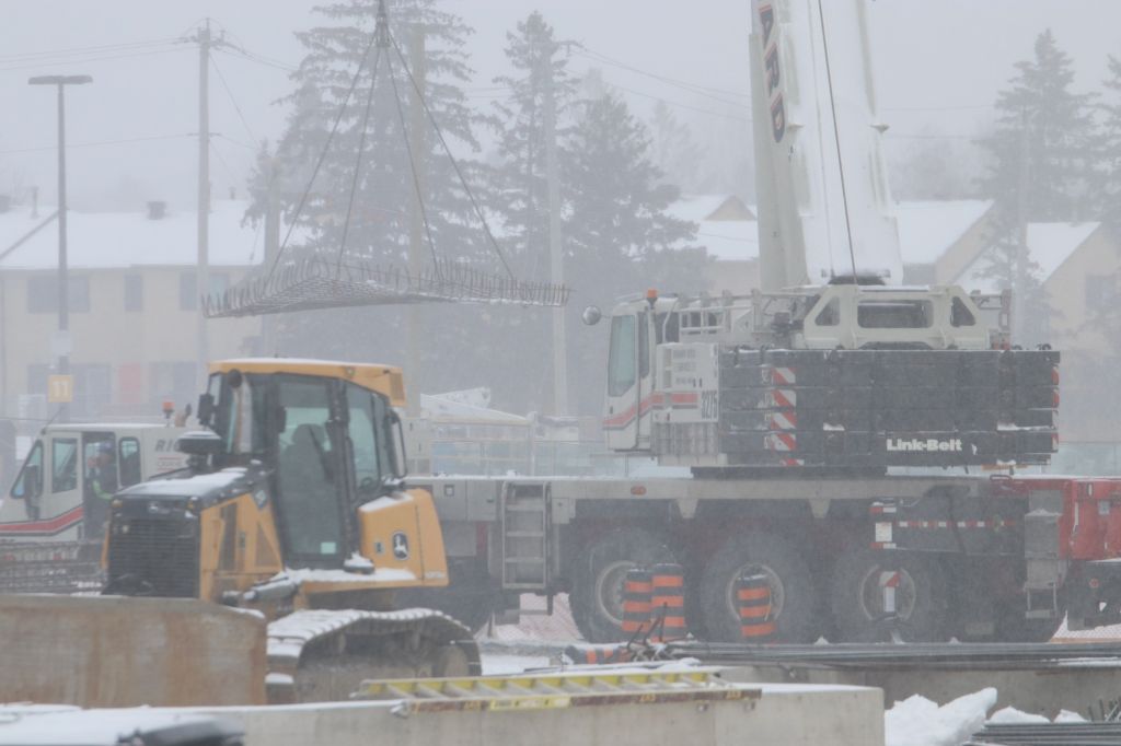 The ARC's construction is underway. On January 14, 2019, the ARC had a crane that had come in to work on the foundation of the building. they continued to work through the cold, snowy afternoon.