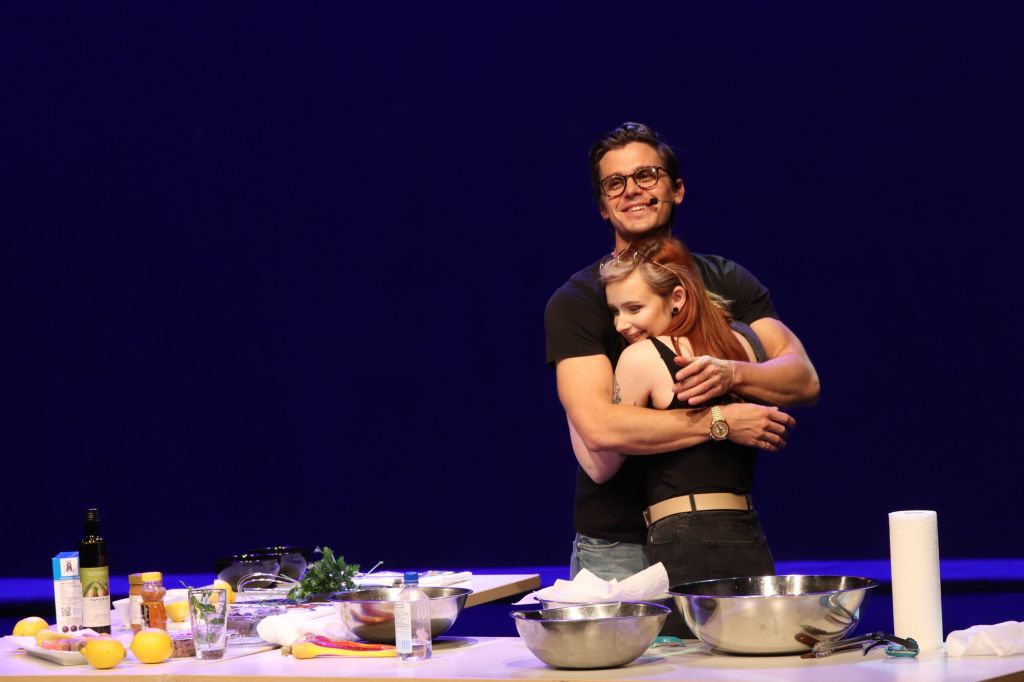 Midg McKee hugs Antoni Porowski during the Evening with Antoni event at the Student Commons Theatre.