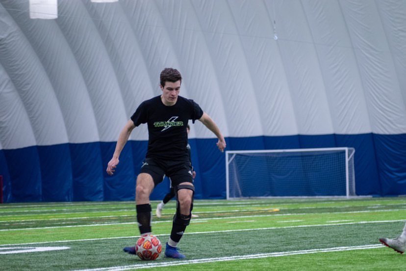 Nicolas Bisaillon practicing in the indoor soccer dome before the shutdown sent everyone home.