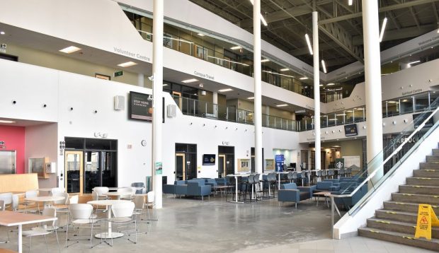 Empty chairs and tables are all that fill the Ottawa campus' E-Building on March 20.