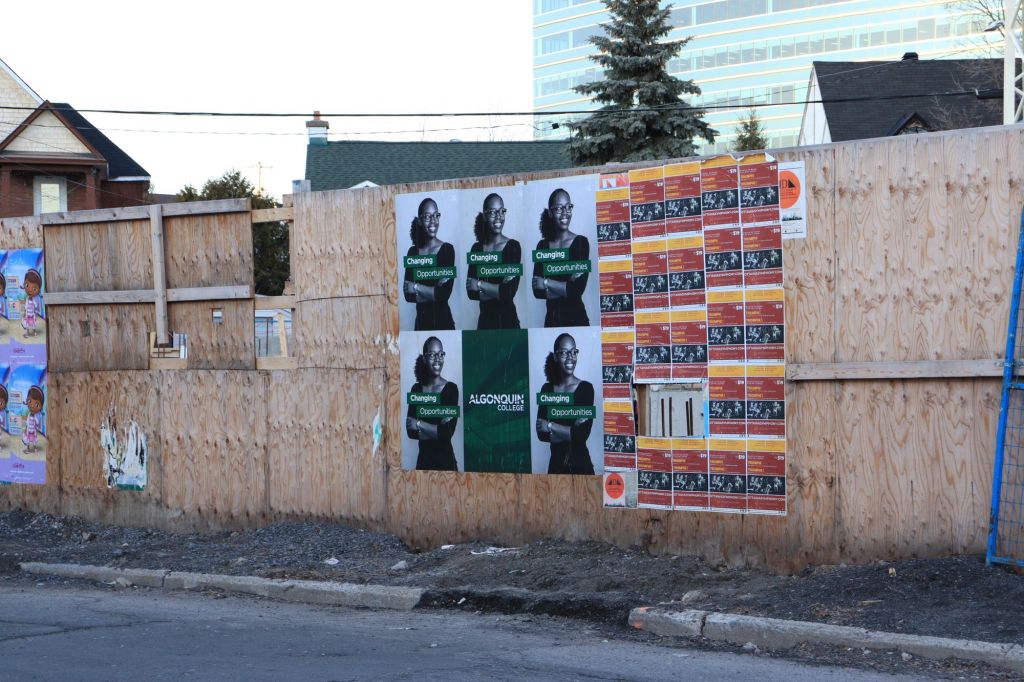 Advertisements in Vanier near Loblaws on McArthur Road during March 2020.