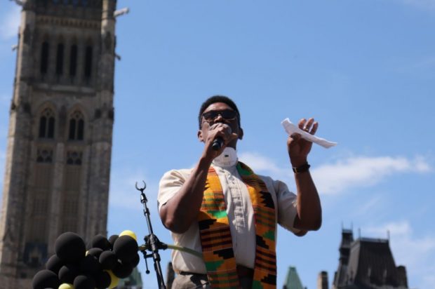 Rev. Anthony Bailey delivers a passionate speech addressing the prevalence of systemic racism in Canada.