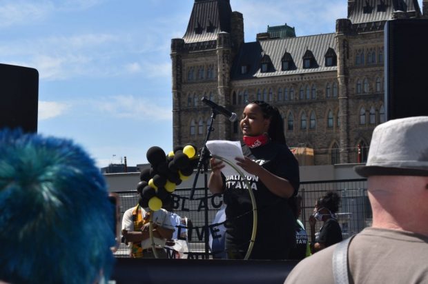 Sameha Ahmed speaks to the crowd on Parliament Hill on June 5