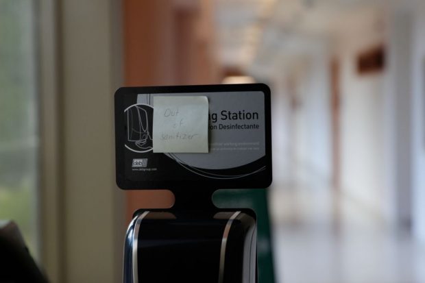 A hand-sanitization station in need of a refill