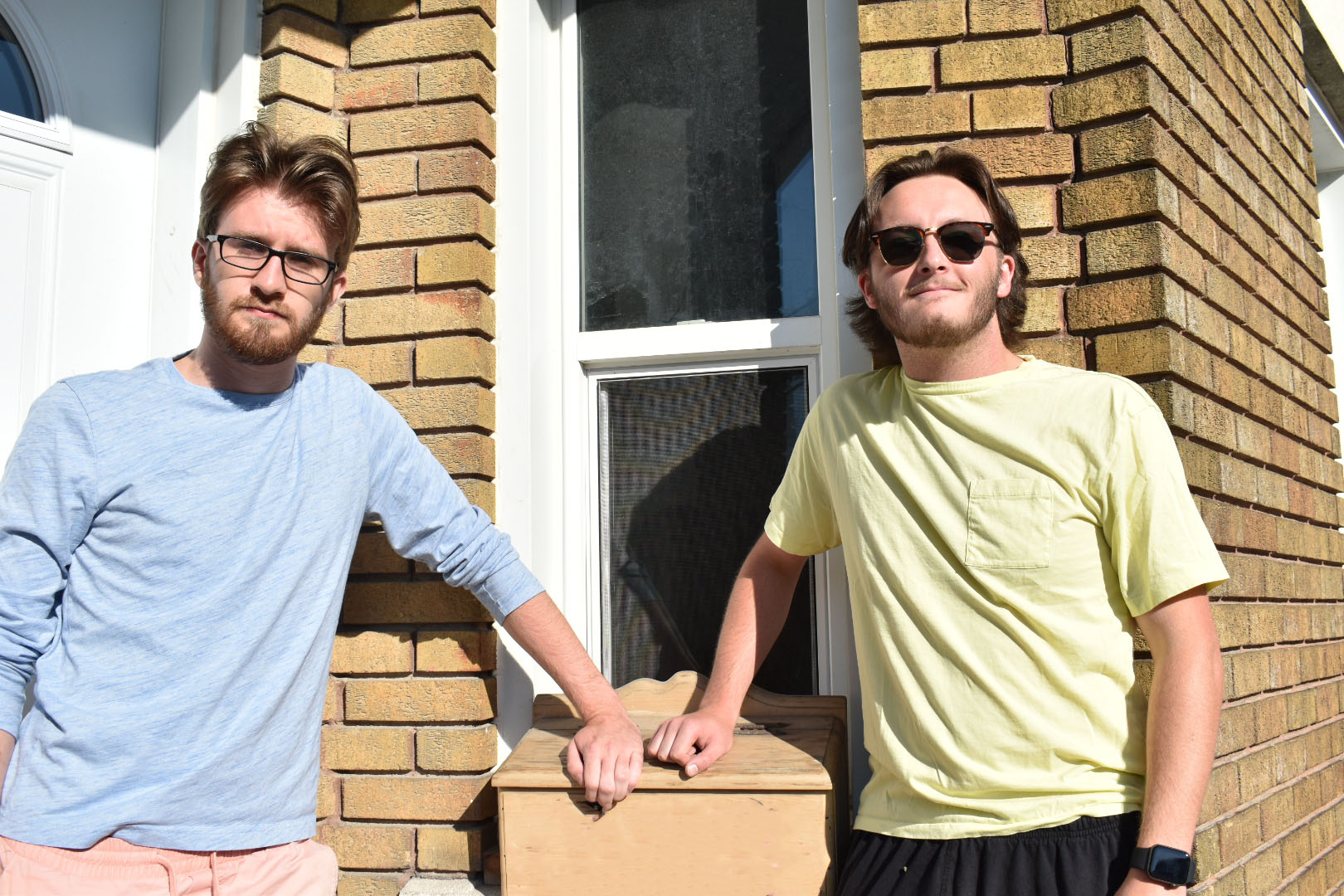 Algonquin alumni Nick Renaud (left) and Aidan Friend at their Westboro rental home, which is slated for demolition in 2022.