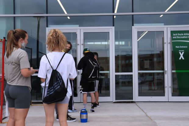 Algonquin College students waiting outside the front doors of the ARC on the morning of September 27.