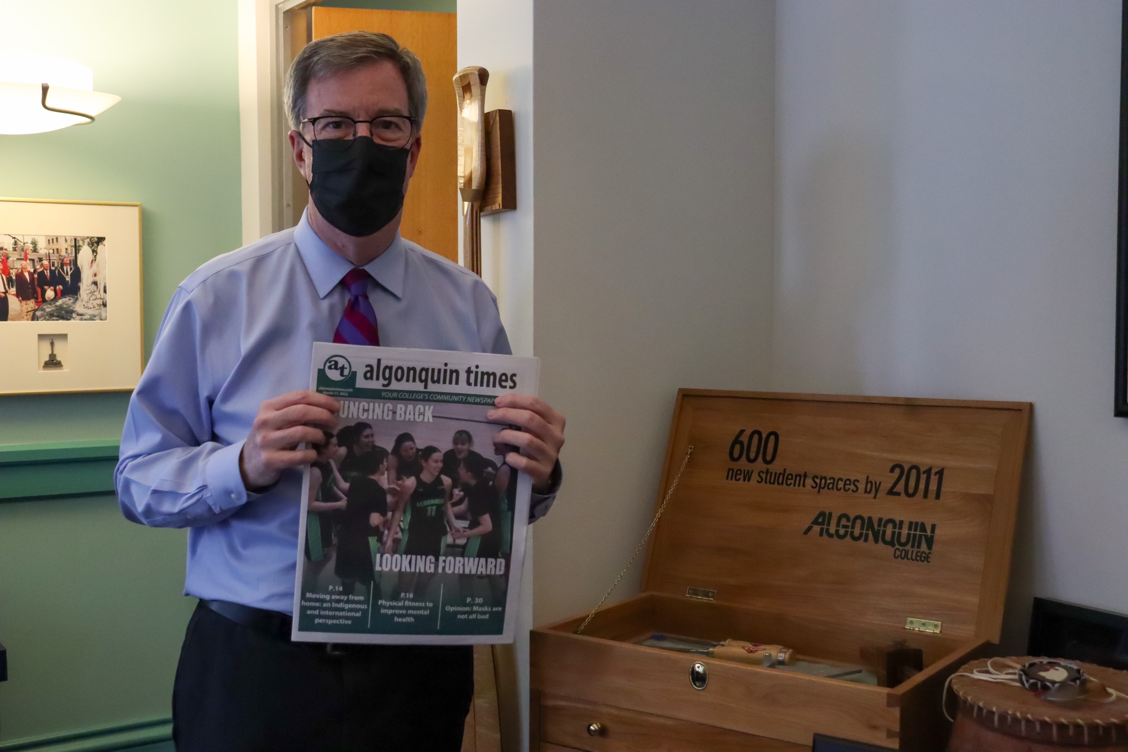 Mayor Jim Watson with the latest copy of the Algonquin Times.
