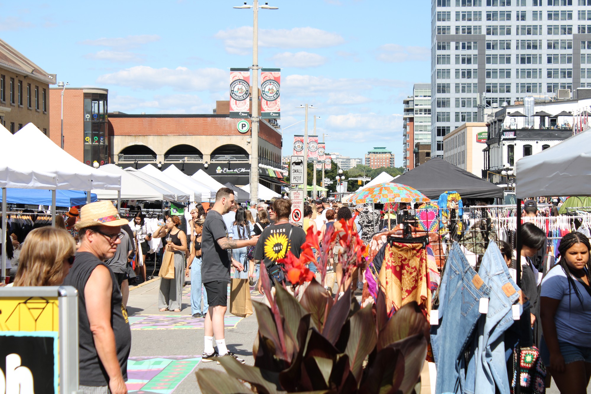 People enjoying the Ooh Festival on York St. in the ByWard Market.
