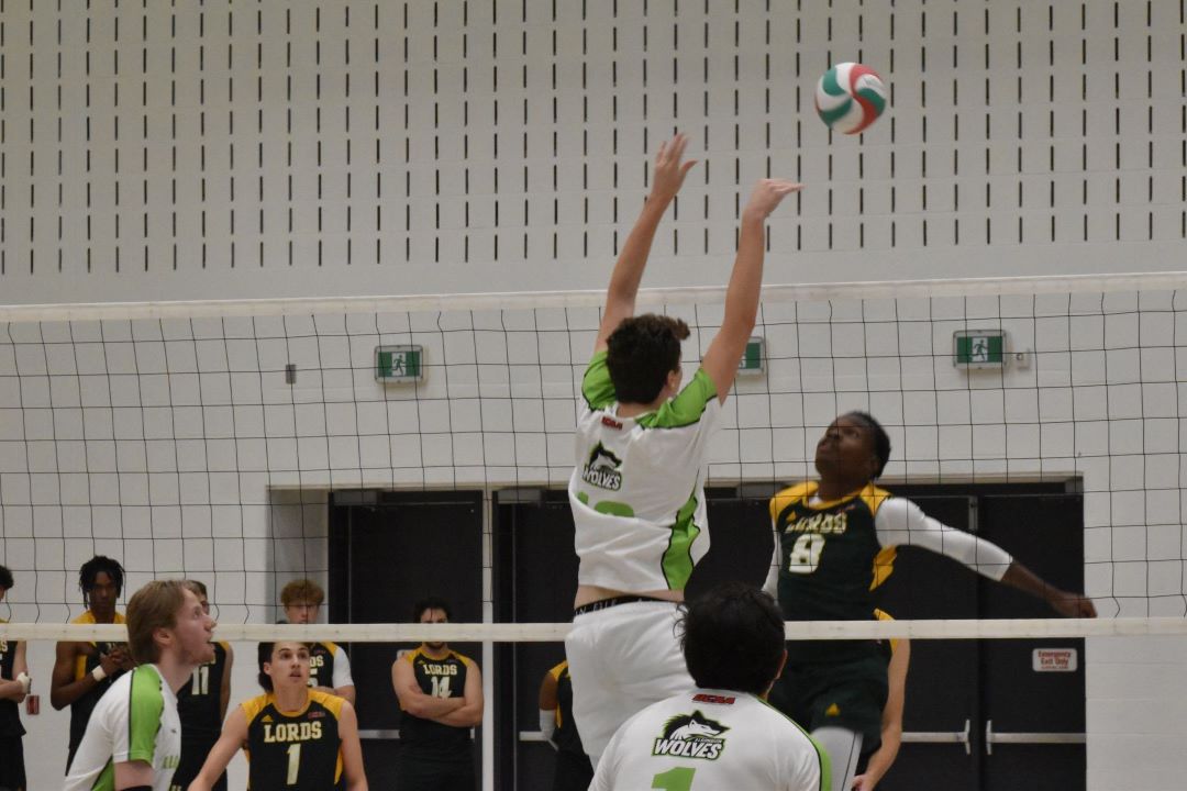 Jacob Matheson blocking the ball during the first set.
