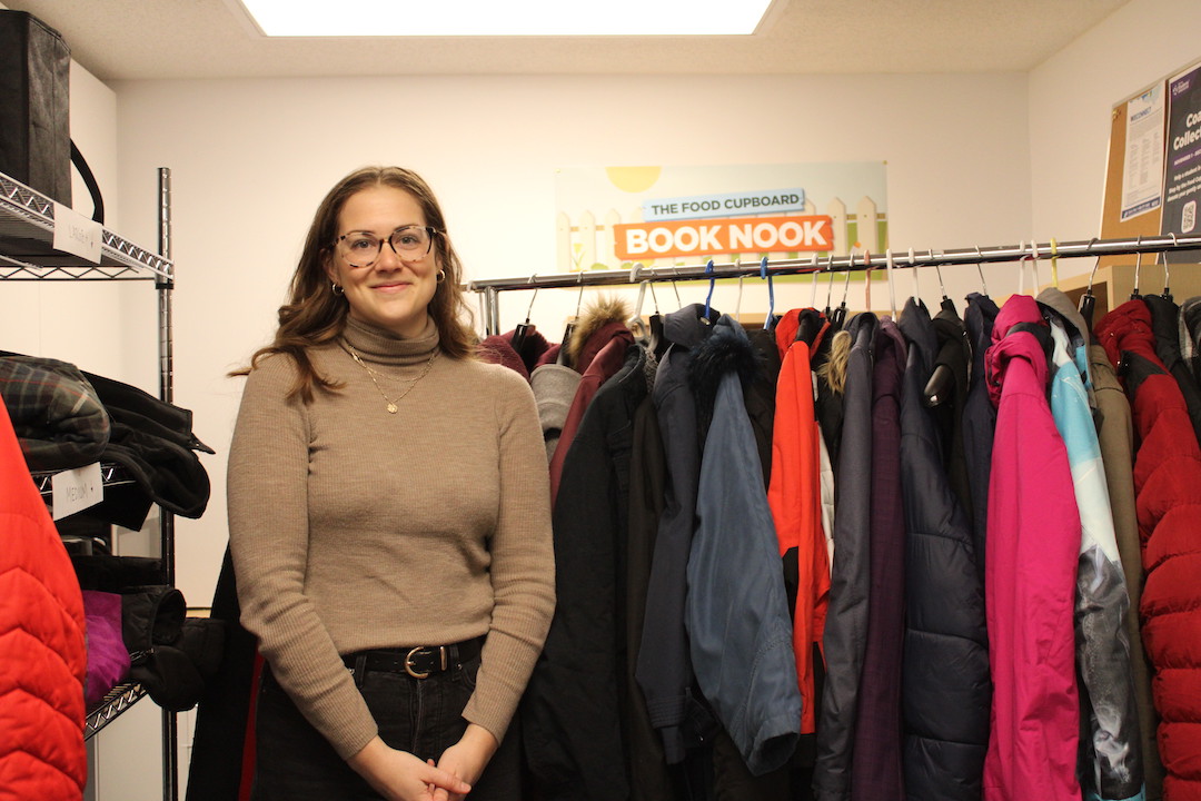 Julia McCann, the program coordinator for the Food Cupboard, is helping to keep students warm this winter.