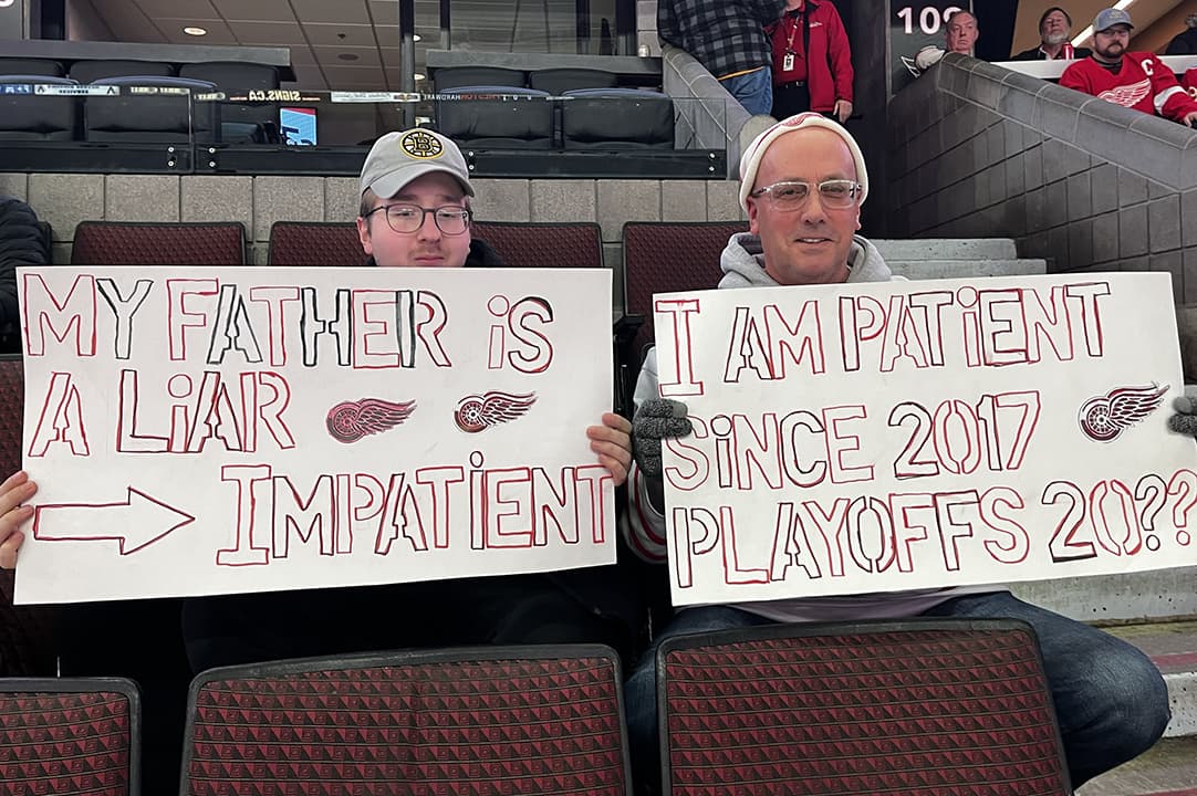 A couple of Red Wings fans brought posters and high hopes to the Sens game on Monday.