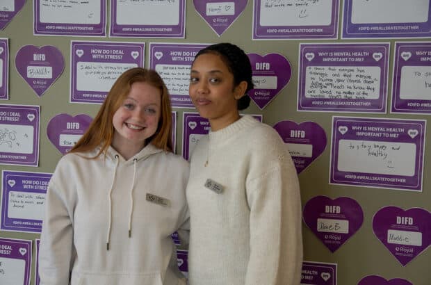 Students' Association vice-president, Gwyn Jones (Left) and Students' Association director, Marwa Alibakhiet (Right) in front of student mental health posters on Jan. 25