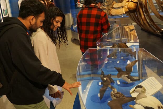Tanay Shah (left) and Pragya Parmar (right) explore the water exhibit at the Canadian Museum of Nature on Thursday.