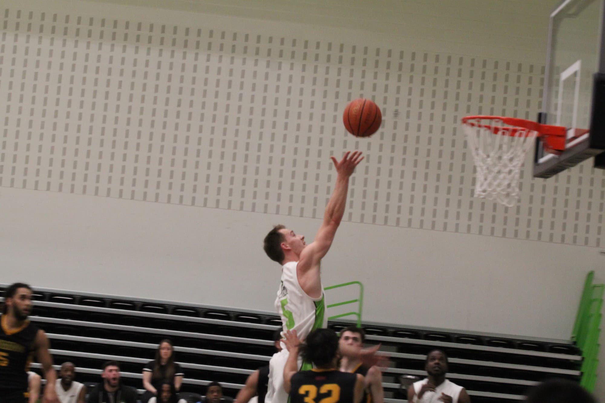Chris Lachapelle drives to the basket in efforts to put in a lay up for the Wolves.