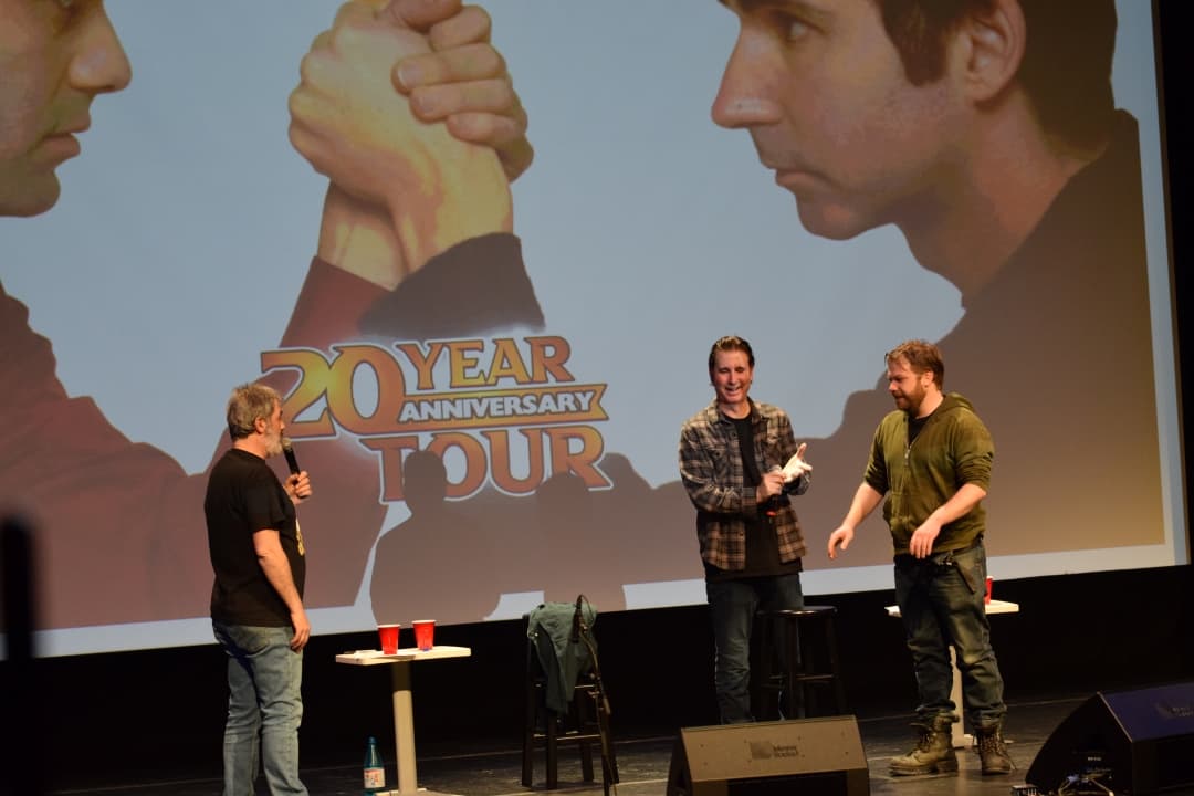 Kenny and Spenny talk to a fan they brought up to the stage.