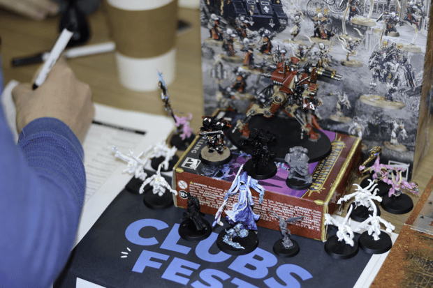 Primarch Club table featured a game piece's painting process, going from put-together pieces to priming and painting. The table was at the Clubsfest event on Feb. 8.