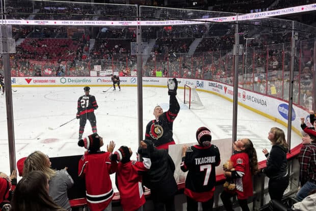 Ottawa Senators captain, Brady Tkachuk, tossing excited fans with posters a puck at the Sens vs Flames game on Monday.