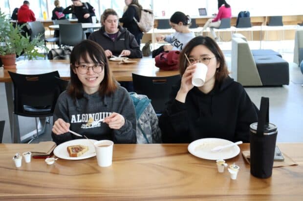 Yik Hang and Tracy Lau from the intermedia design program having breakfast together