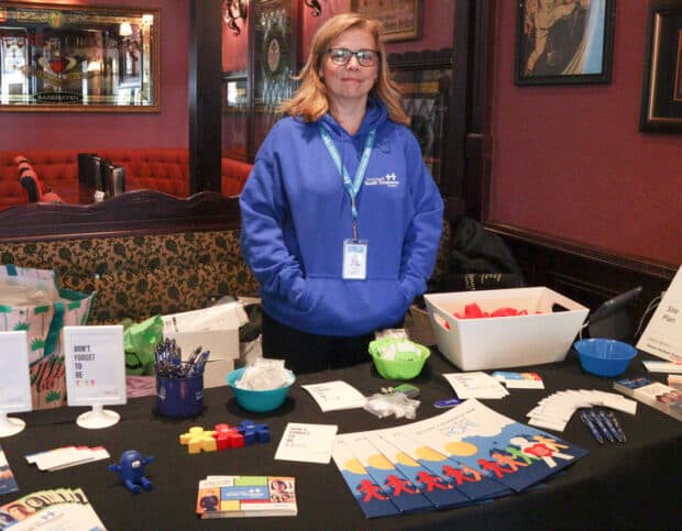 Senior director of philanthropy for the Dave Smith Youth Treatment Centre, Cindy Manor, mans the charity's information booth.