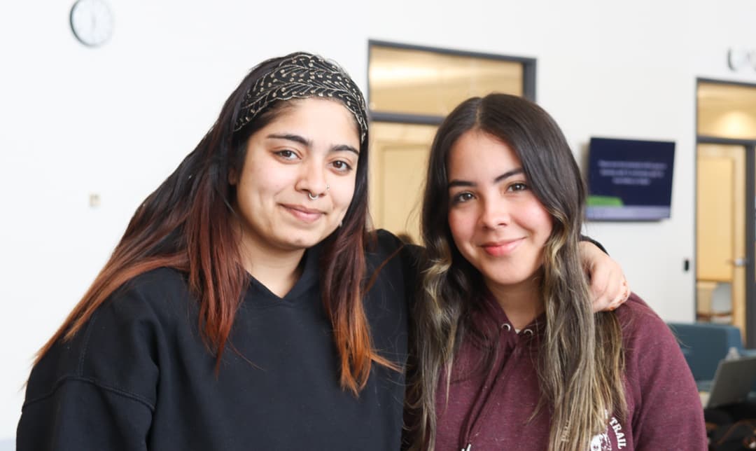 Kareen Koul and Nice Gonzalez, students in bakery and pastry arts management program, were going to the gym when they spotted the long queue and the mysterious black curtain in the Student Commons. 