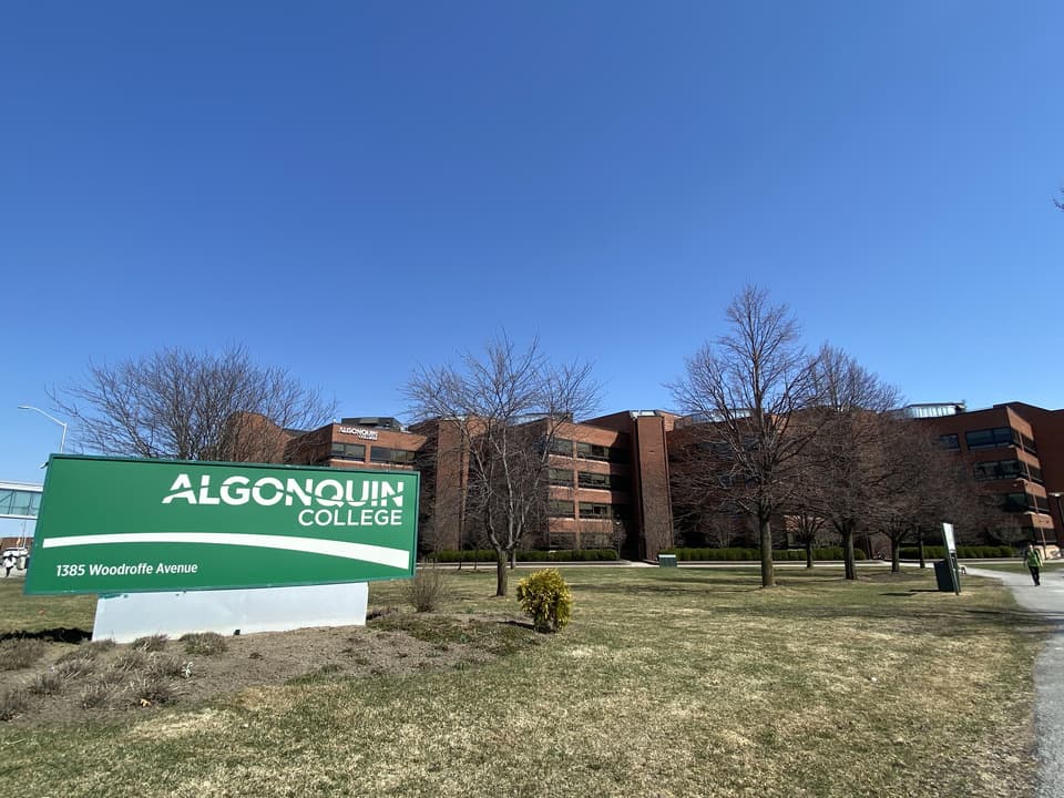 An outside view of the administrative building for Algonquin College on a sunny day in April.