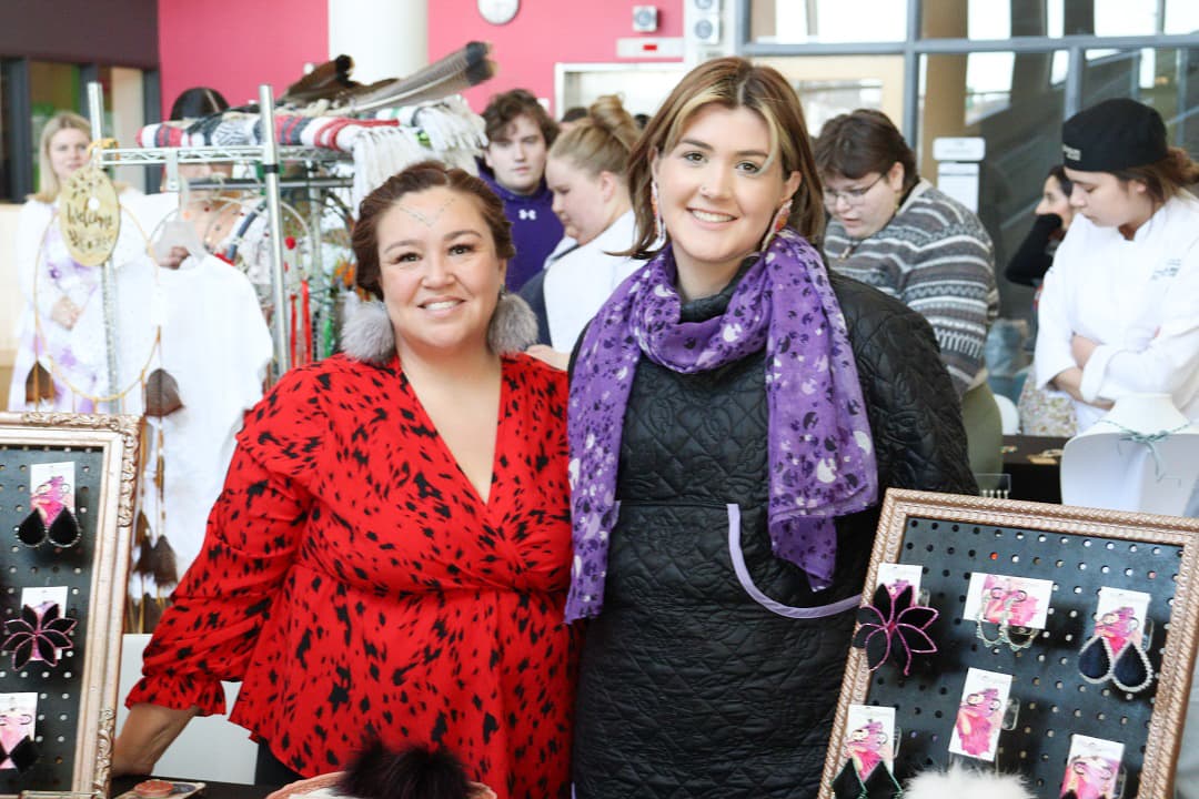Amanda Latreille (left) and Anabelle Latreille (right) sold jewelry, candles, seal skin and fox fur at their booth.