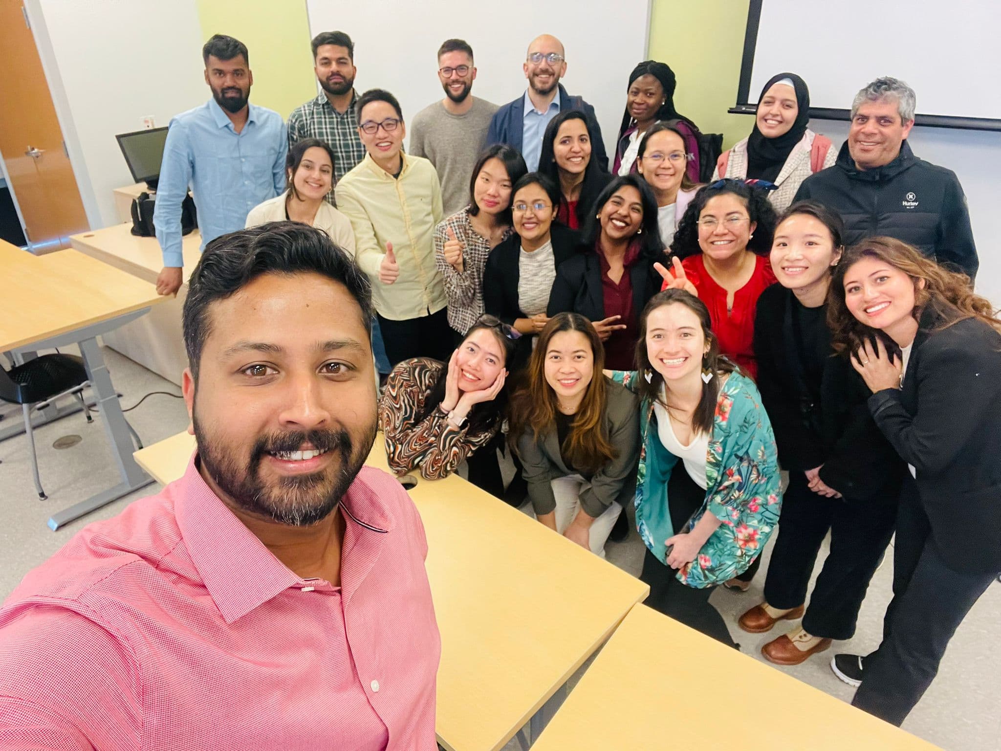 Rosin Sara Roy enjoys brand campaigns, social media strategy and brand measurement courses. Here she is with her classmates - center, in the second row from the back - at the end of a class at Ottawa campus.