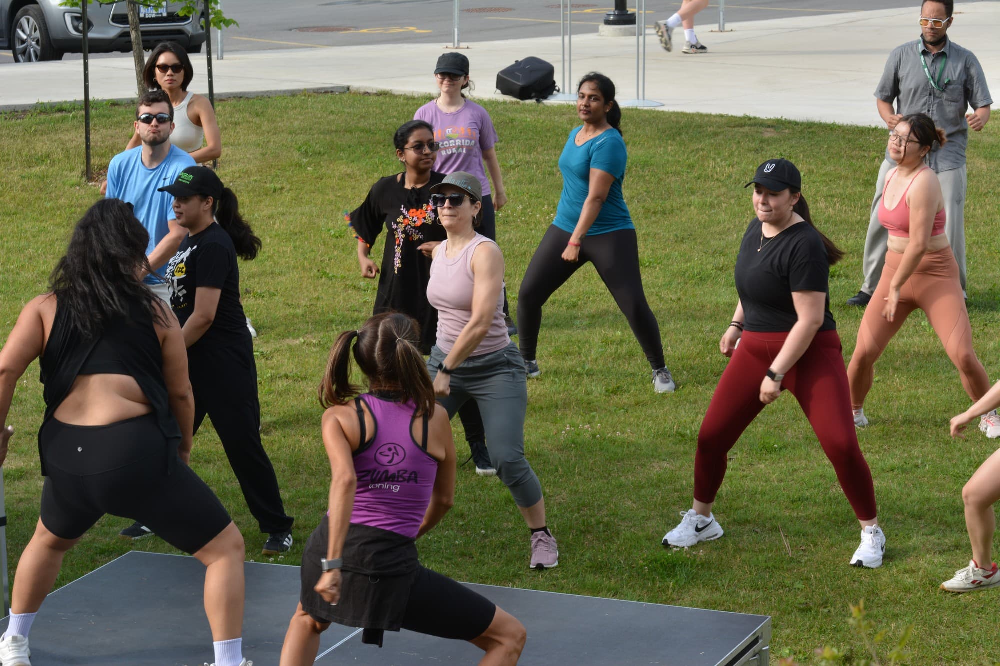 Zumba on the lawn participants getting their heart beats up