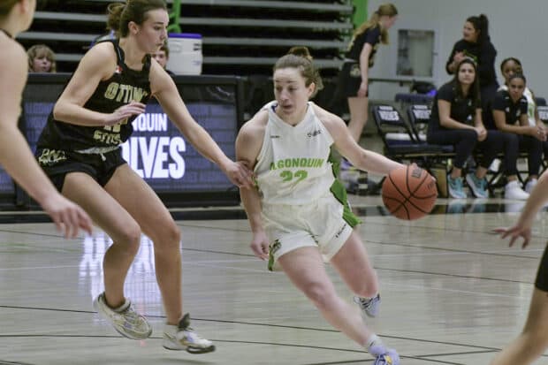 Kate Dahmer driving to the hoop.