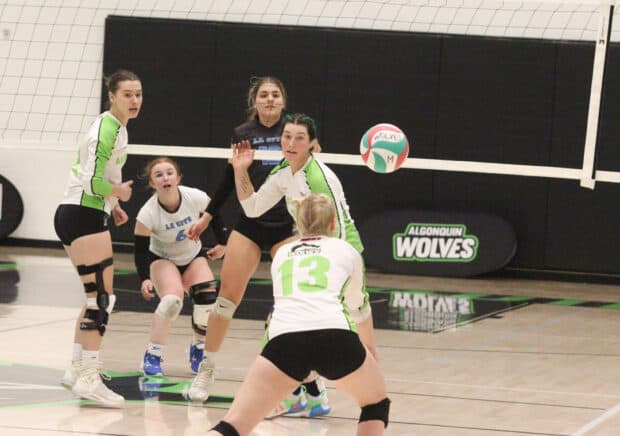 Gabrielle Paquette going for a dig as La Cite send the ball over.