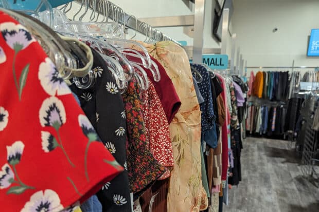 Inside Plato's Closet Merivale, the store is filled to the brim with old clothes looking for a new life.