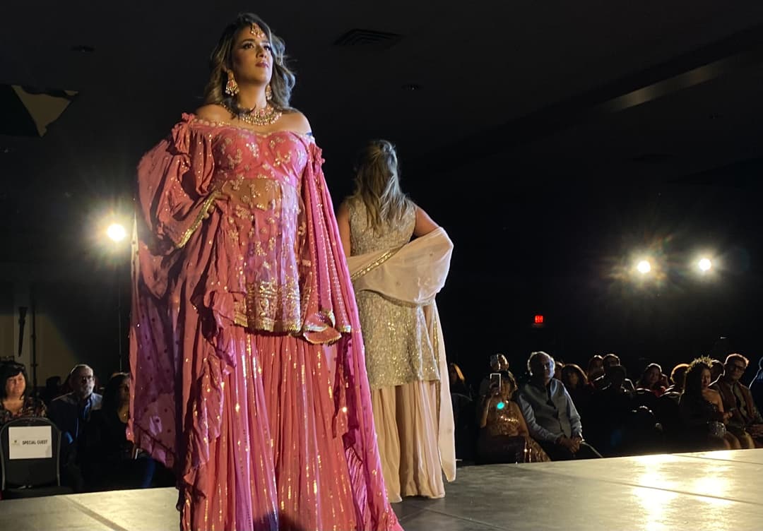 Models showcase two of Amna Akrams newest designs.