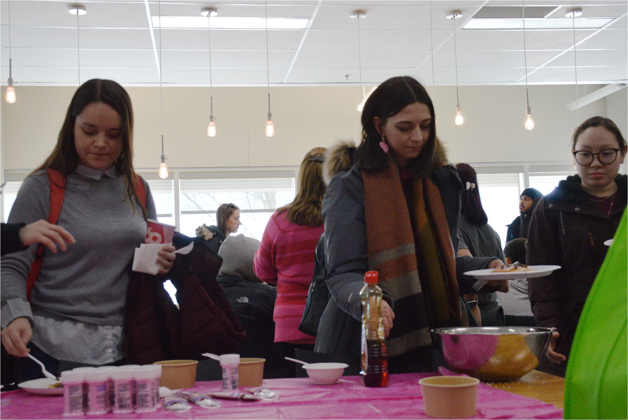 Students enjoying their free pancakes at the event on Feb. 14.