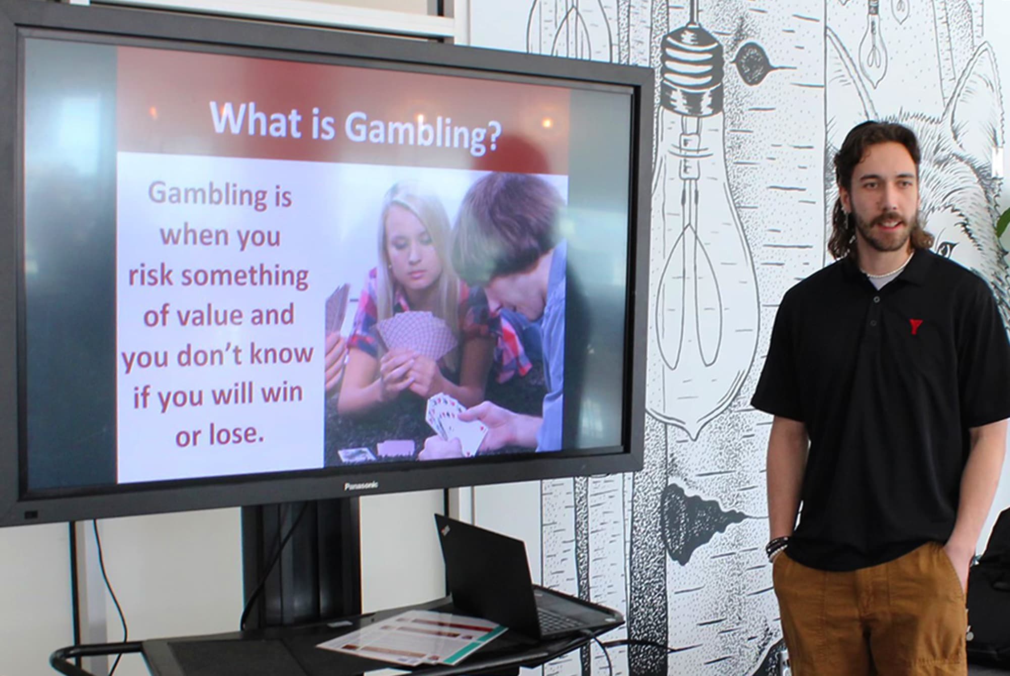Nick Renaud speaks during the Gambling & Stigma event at the AC hub.