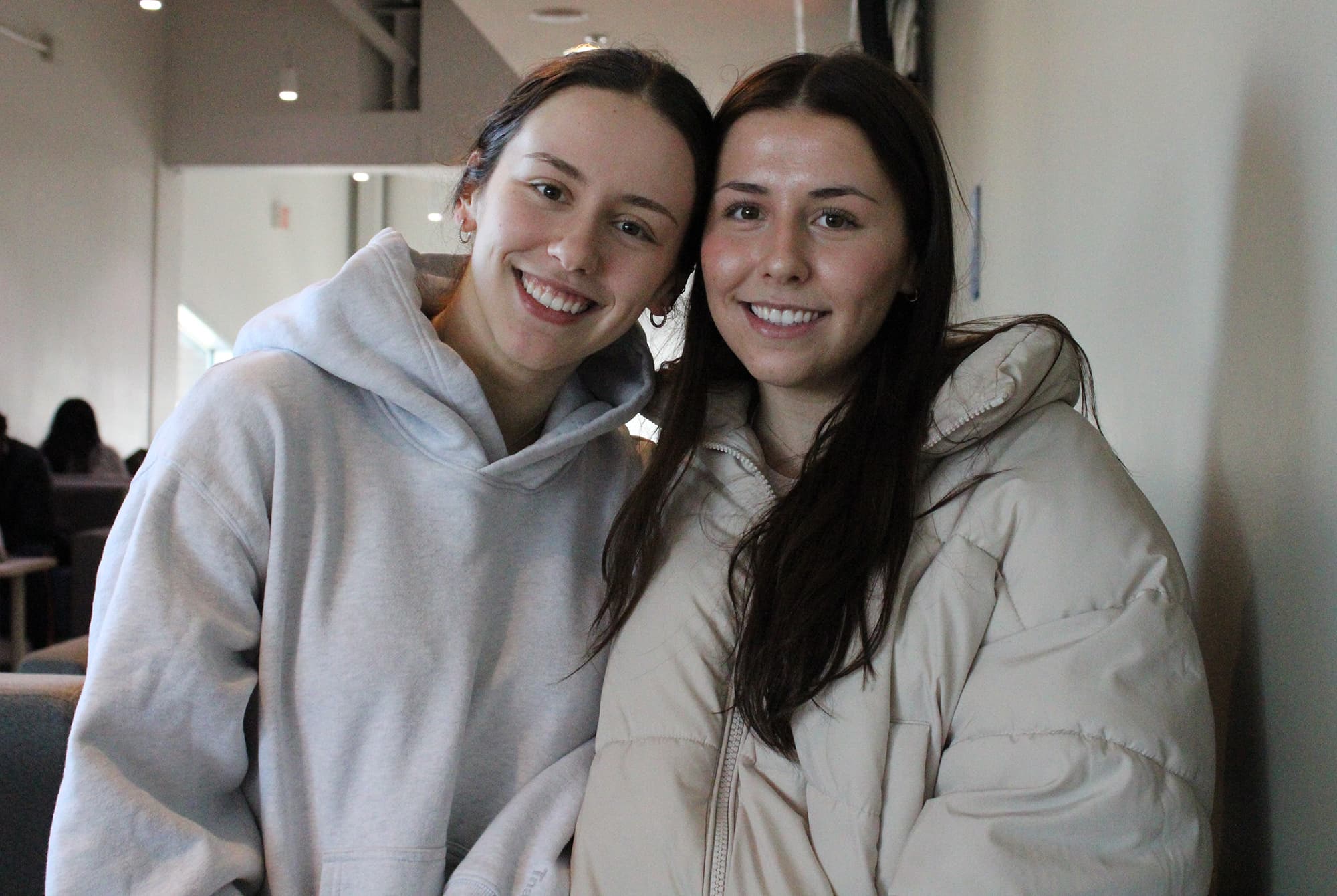 Libby (left) and Leah Hirst pose in E-building.