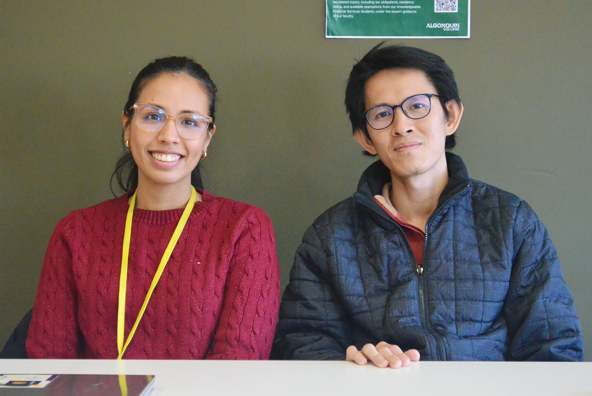 Daniela Estupinan (left) and Dane Ly (right) are ready to help at the student led tax workshop.