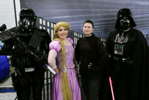 Cosplayers posing for photo-op with Capital City Garrison at Geeked Out on Saturday, March 23