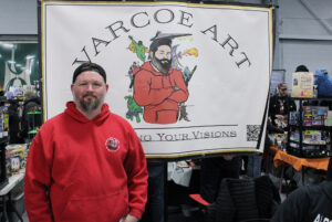 Mike Varcoe in front of his booth for Varcoe Art at the Nepean Sportsplex for Geeked Out on Saturday, March 23