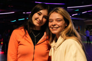 Alessia Raguseo (left) and Gina Sperotto (right) having fun roller-skating.