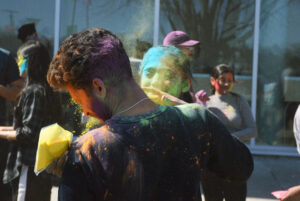 Two students enjoying their time at the festival of colour