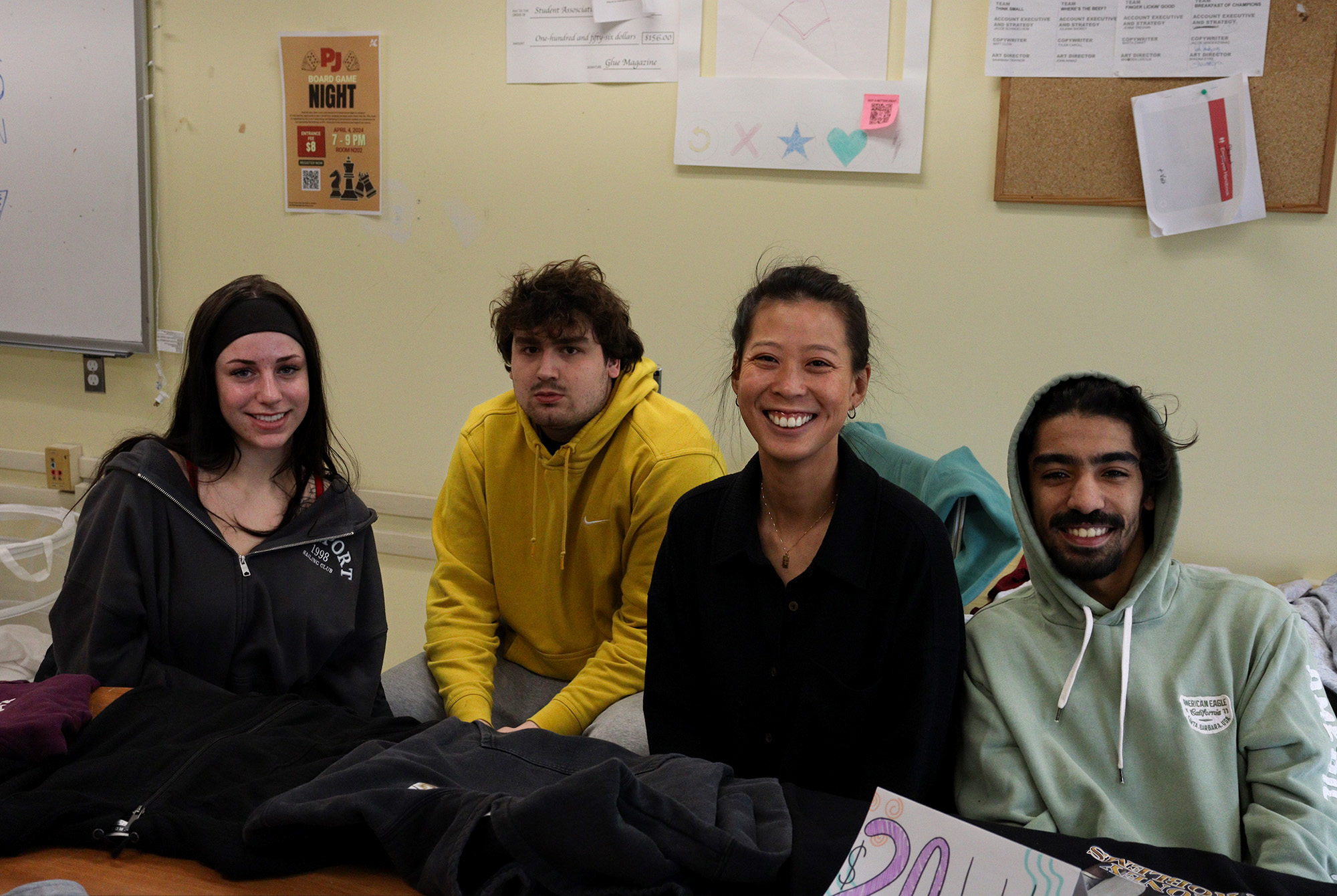 Makenna Warwick, Luka Kova, Bonnie Chan and Mehdi Sossey Alaoui helped organize a thrift shop on March 27. Ben Akongo (not shown) also provided help with the event.